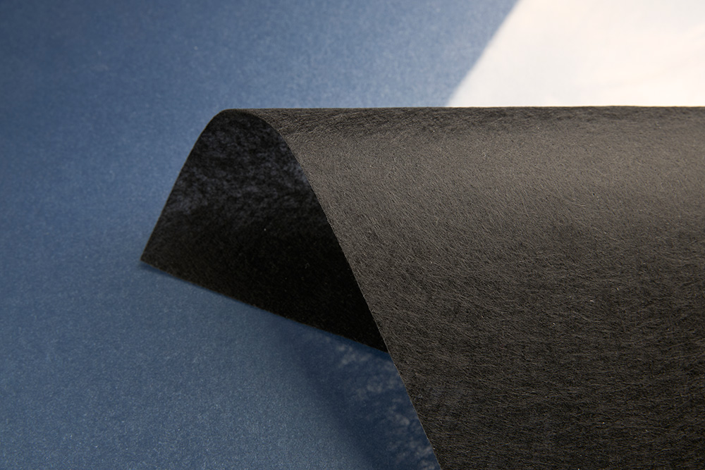 Nonwoven materials for cable wrapping and fixing tapes