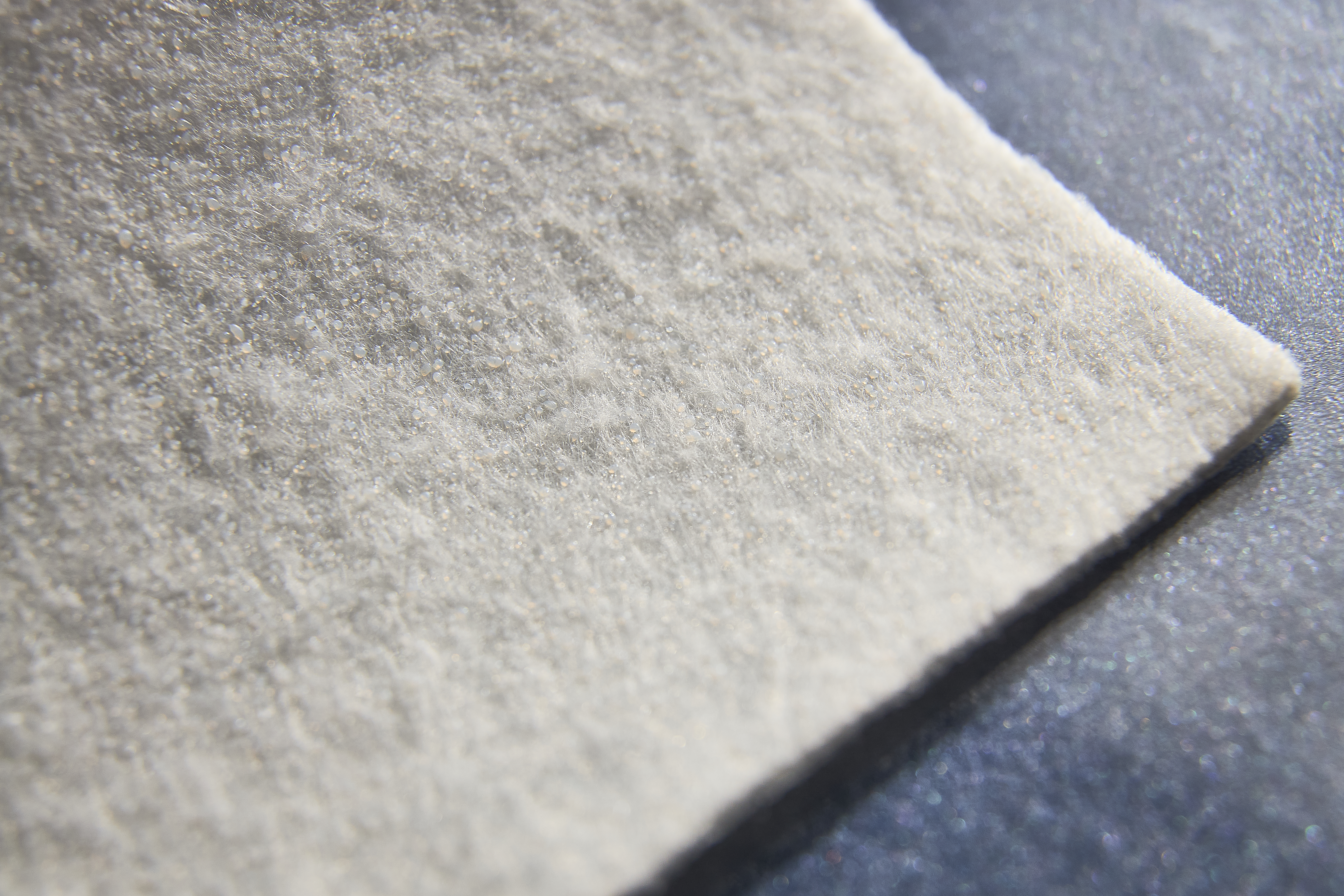 carriers for polymeric roofing membranes