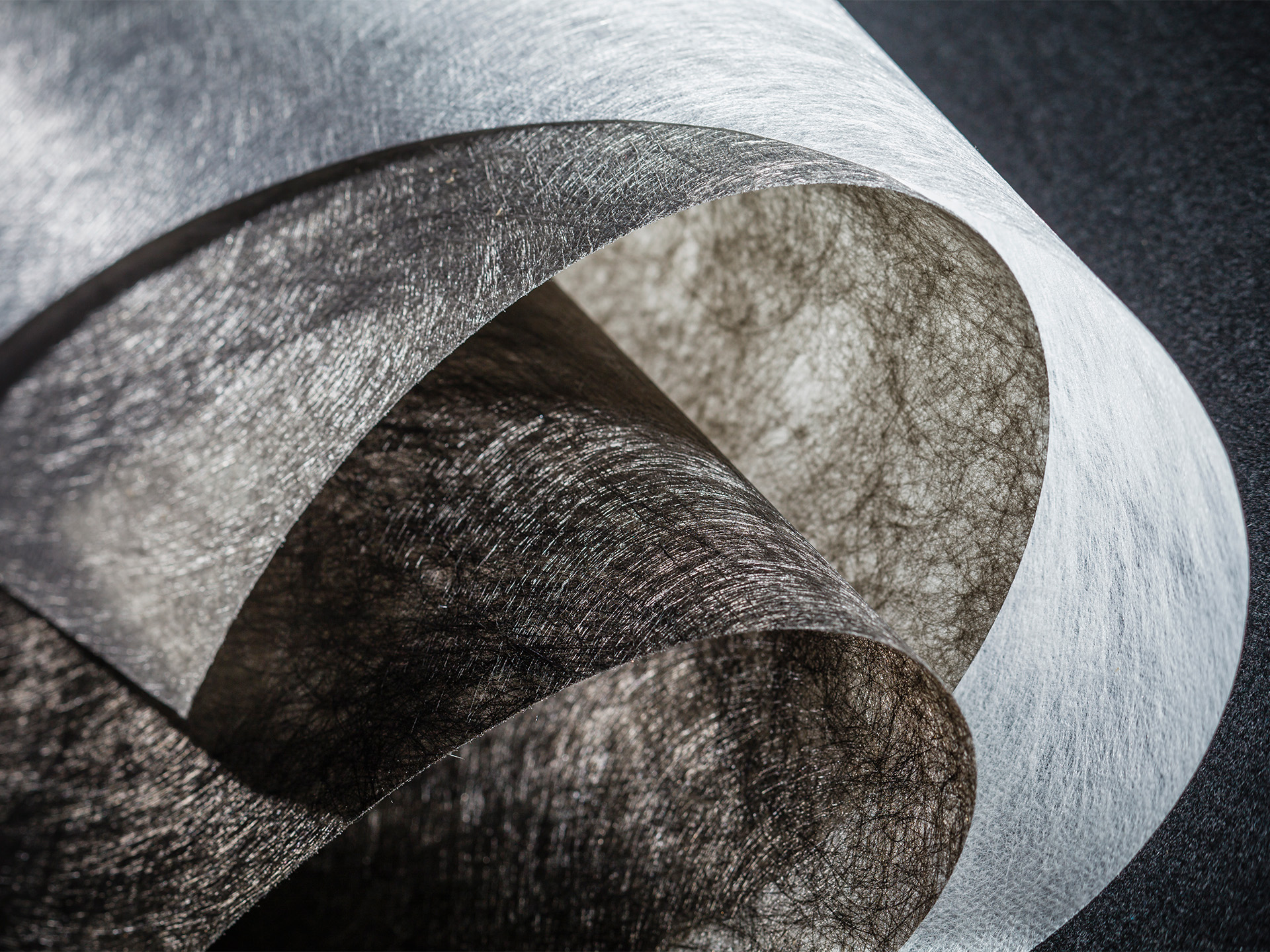 Primary backings for molded car carpets